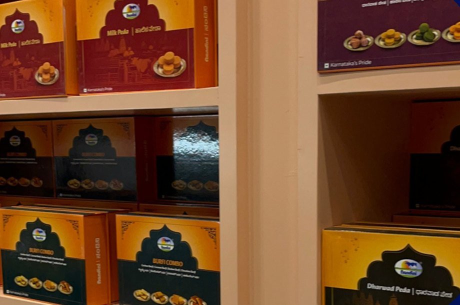 Milk Peda and Dharwad Peda boxes on the T2 shelf